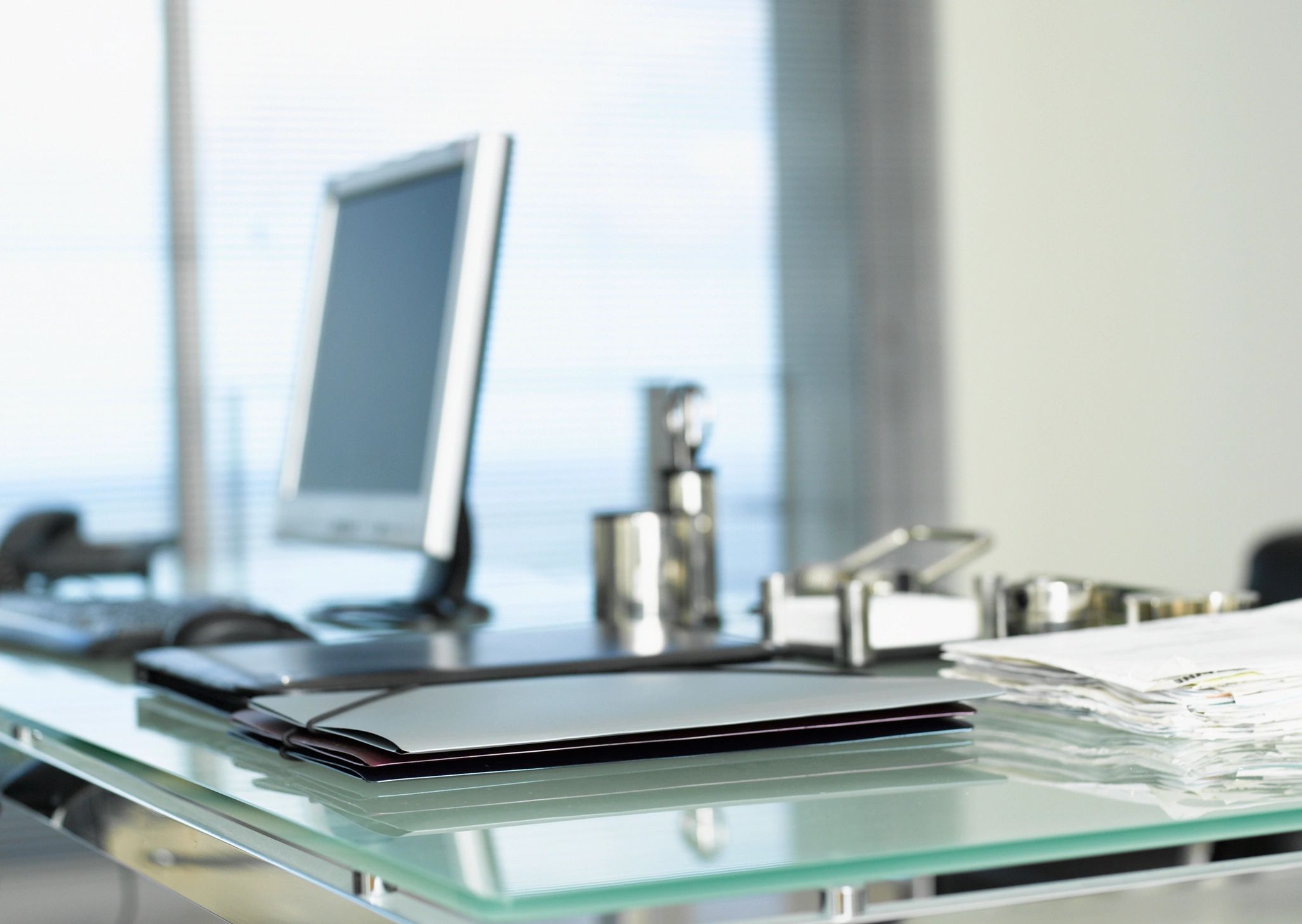 Business documents and folders on an office desk